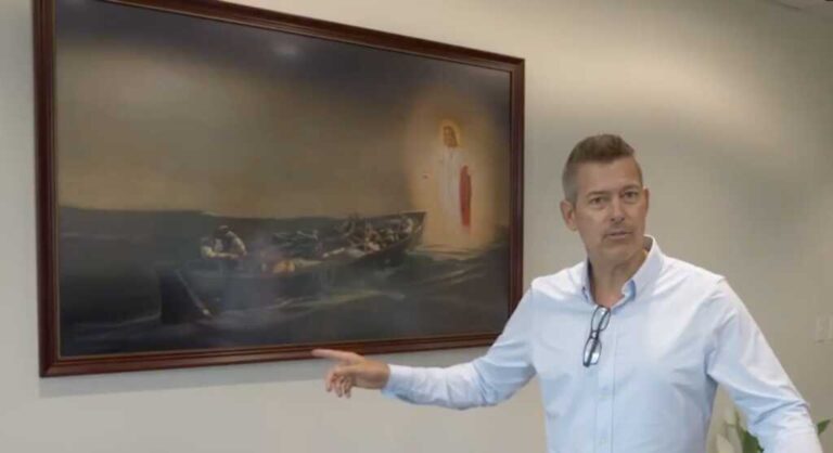 Shawn Duffy Hangs A Portrait Of Jesus In His Job